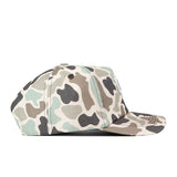 The UCF Knights Huntsman Hat by No Rivals is an adjustable cotton cap featuring a green, tan, and black camouflage pattern, displayed from the side against a white background.