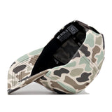 The UCF Knights Huntsman Hat by No Rivals is shown upside down, revealing its black interior, sweatband, and No Rivals label along with a QR code on the inner tag.