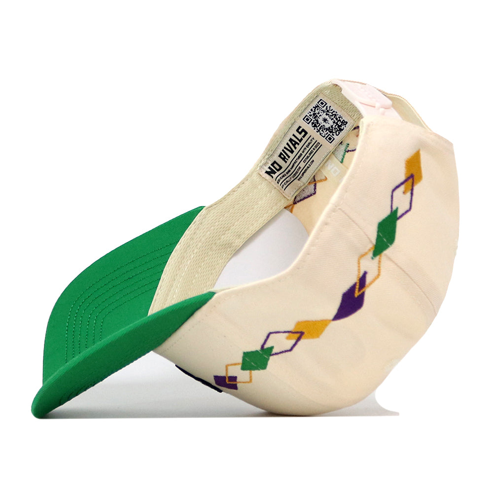 Here’s a rewritten version based on your product data: The No Rivals Tulane Mardi Gras Argyle Hat features a cream and green design with the cap flipped inside out to showcase a vibrant geometric argyle pattern in purple, green, and yellow along the side, plus visible tags and interior stitching. An officially licensed embroidered Tulane logo decorates the front, while an adjustable snapback closure ensures a secure fit.