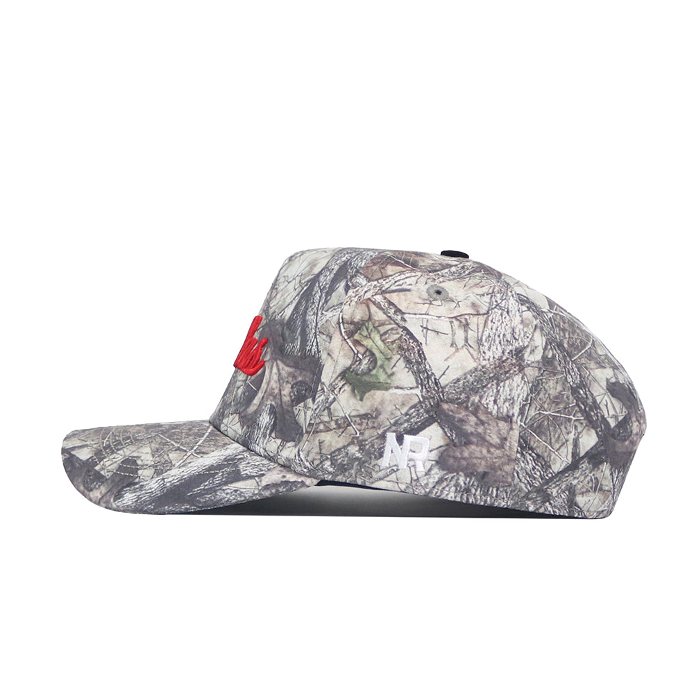 Side view of the No Rivals SMU Outland Hat, a camouflage snapback with flat brim crafted from premium cotton. Features red front embroidery, white MF logo above the brim, and an officially licensed woodland pattern.