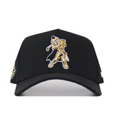 The UCF Golf Hat - Black by No Rivals features an embroidered gold and white knight mascot with sword on the front, a curved brim, snap back adjustment for a custom fit, and additional side logo details.