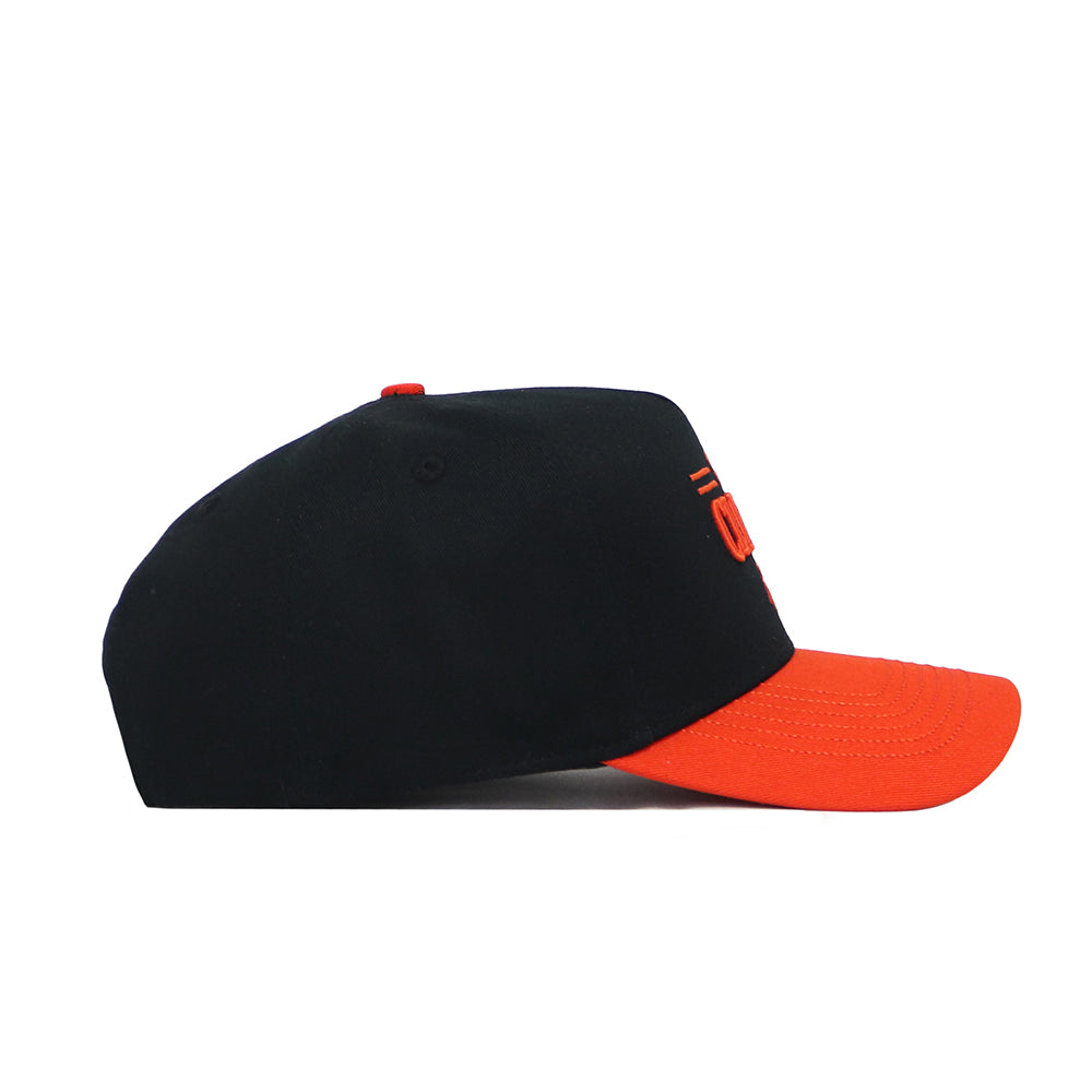 The No Rivals Clemson Tailgate Hat is a black snapback with a structured fit, orange curved brim, and orange front embroidery. Shown in side profile view against a white background.