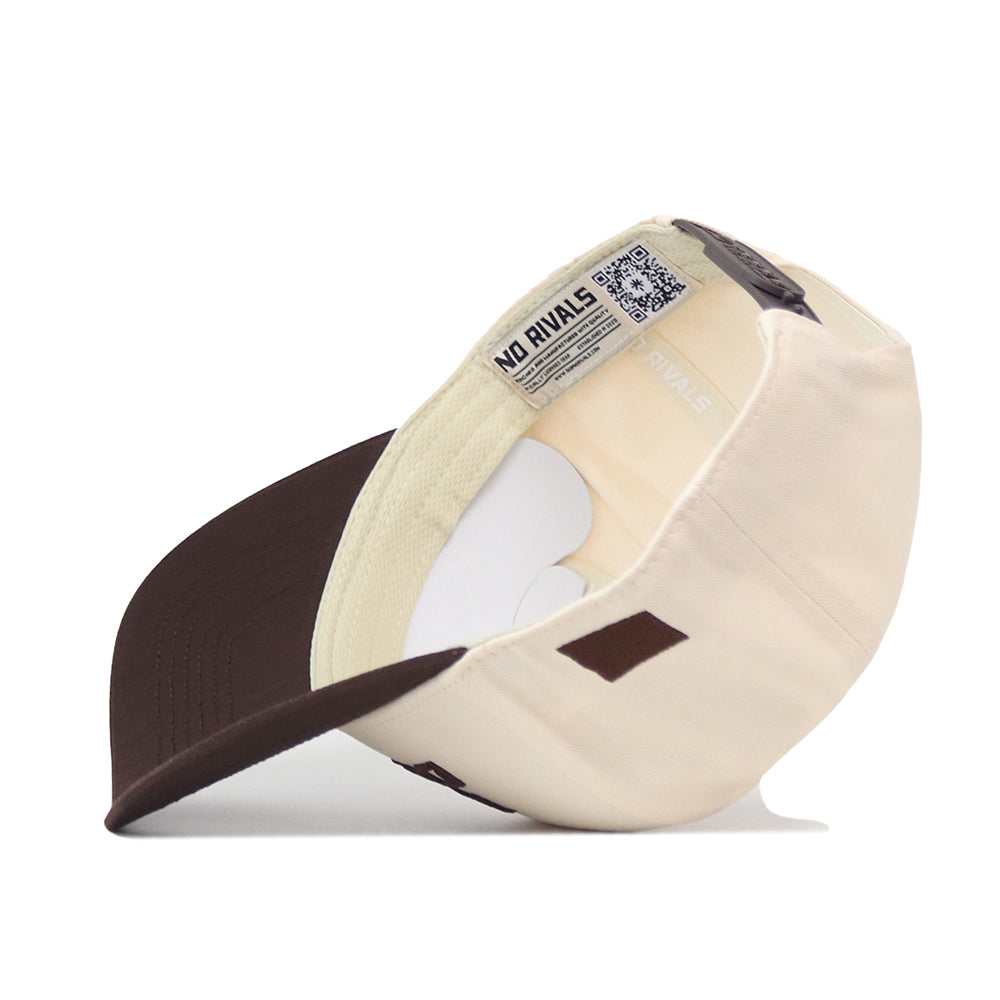 The No Rivals North Dakota Espresso Hat is a beige and brown Snap Back baseball cap, shown inside out to highlight its interior tags, intricate stitching, and QR code label beneath the brim—an ideal addition to your Gameday Fit.