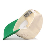 The Tulane Mardi Gras Roulez Wave Hat by No Rivals is displayed upside down, highlighting its inner label and detailed stitching. With a curved green brim and an off-white crown, this snapback is the perfect addition to your next gameday fit.