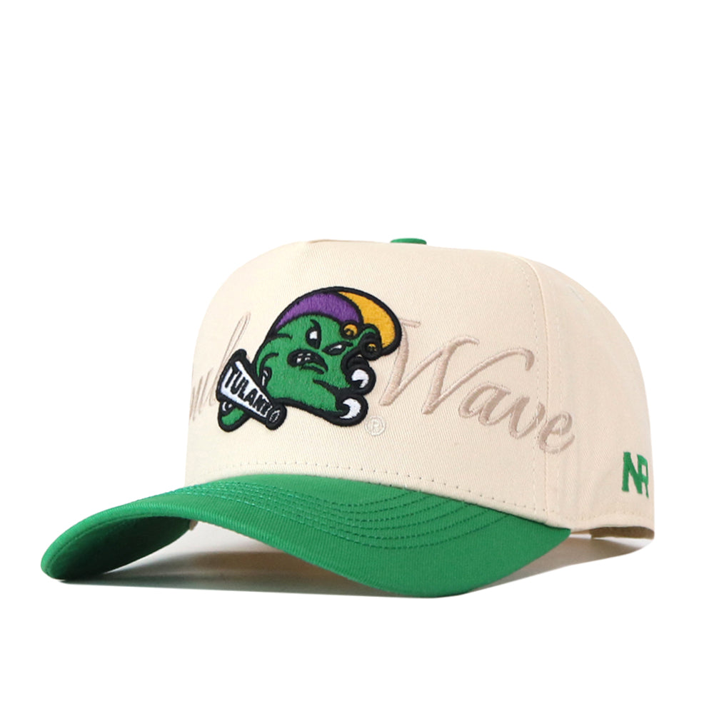 The No Rivals Tulane Mardi Gras Roulez Wave Hat is a beige and green baseball cap featuring a cartoon wave mascot holding a bat and sporting the Tulane logo, with “Wave” embroidered on the front and a classic green bill. This Gameday Fit essential includes an embroidered logo and an adjustable snap back for lasting comfort.