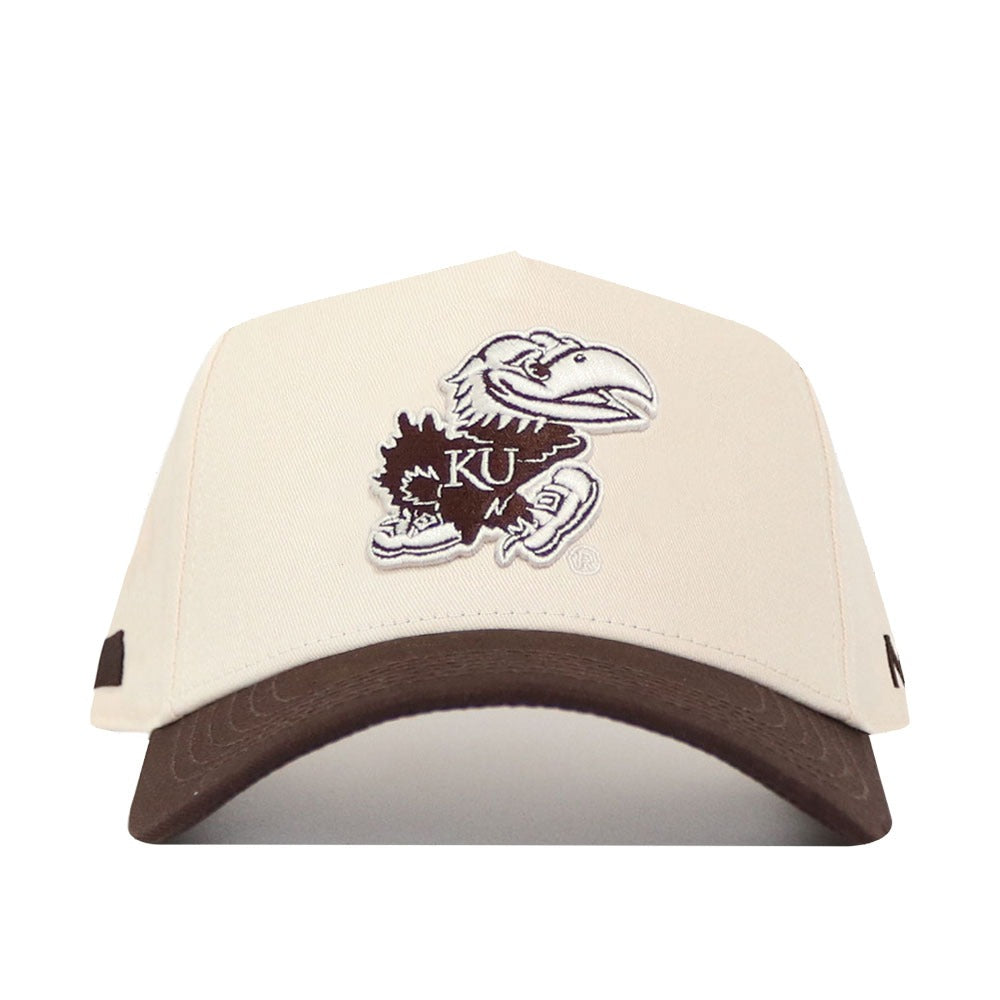 The No Rivals University of Kansas Espresso Hat is a beige structured snapback with a brown brim, featuring the Jayhawk logo in brown and white embroidery on the front.