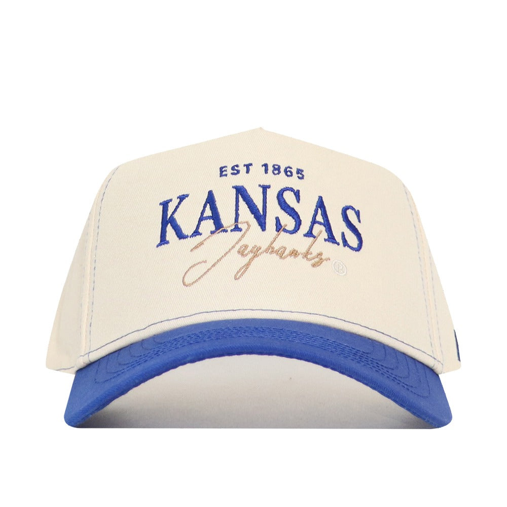 The No Rivals University of Kansas Vintage Hat is a cream and blue cotton baseball cap with "EST 1865 KANSAS Jayhawks" embroidered in blue and gold, adjustable snap back, and is officially licensed.