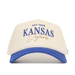 The No Rivals University of Kansas Vintage Hat is a cream and blue cotton baseball cap with "EST 1865 KANSAS Jayhawks" embroidered in blue and gold, adjustable snap back, and is officially licensed.