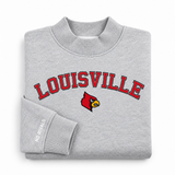 Oversized grey Louisville Mock Neck sweatshirt featuring the word LOUISVILLE in red text with a cardinal bird logo underneath.