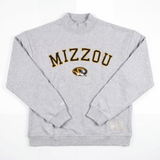 The No Rivals Mizzou Mock Neck features large yellow and black "MIZZOU" lettering and the University of Missouri tiger logo on heavyweight gray cotton, shown laid flat against a white background.
