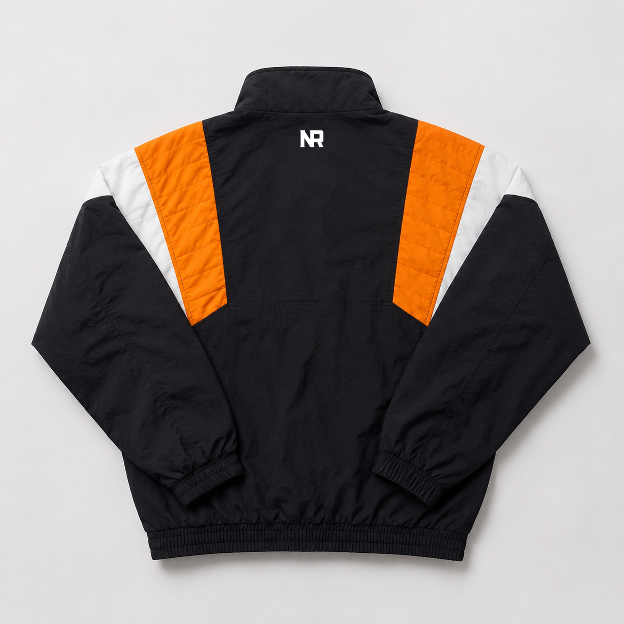 The No Rivals Tennessee Retro Windbreaker is a black polyester jacket with elastic cuffs and hem, orange and white diagonal back panels, and a small embroidered NR logo below the collar.