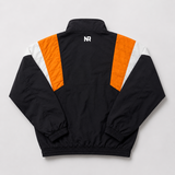 The No Rivals Tennessee Retro Windbreaker is a black polyester jacket with elastic cuffs and hem, orange and white diagonal back panels, and a small embroidered NR logo below the collar.