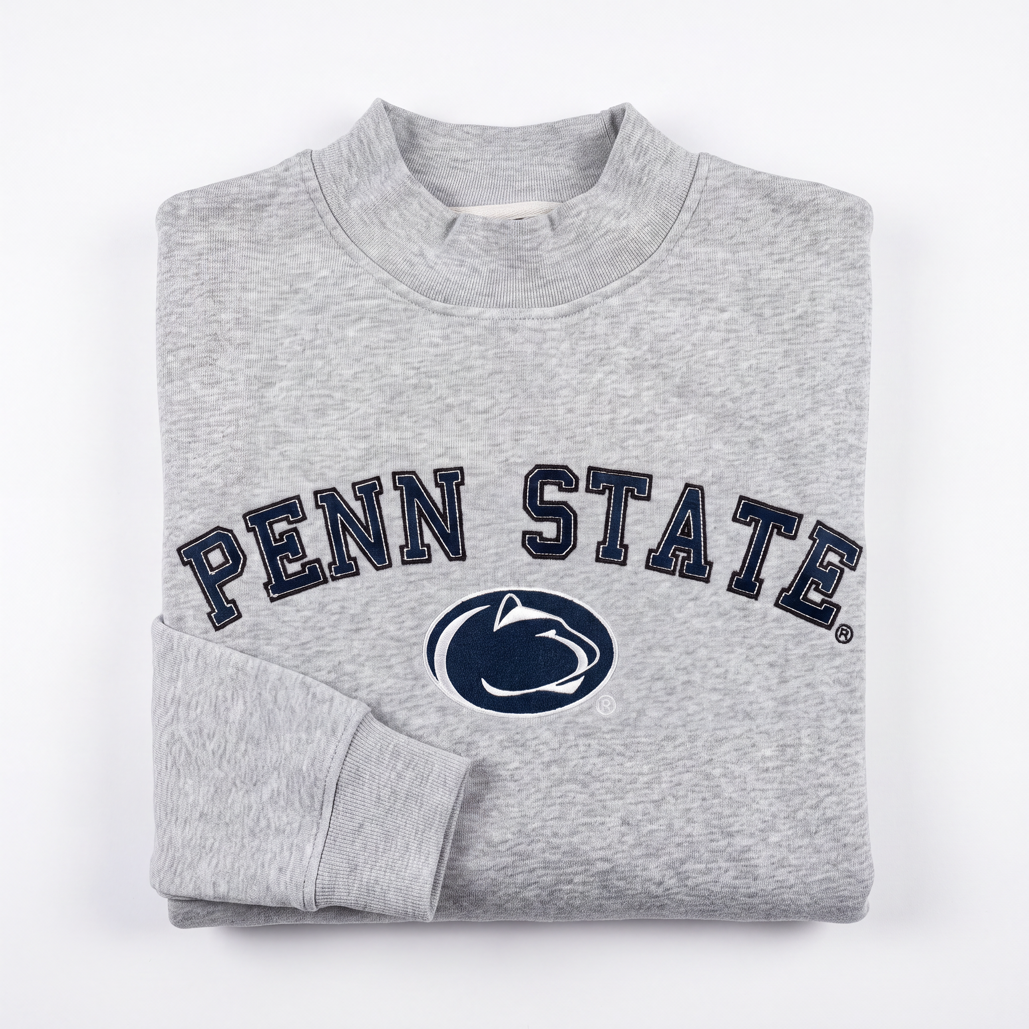 A folded Penn State Mock Neck sweatshirt by No Rivals, featuring PENN STATE and the Nittany Lion logo printed in navy blue and white on the front, crafted from heavyweight cotton with a soft fleece interior, displayed on a white background.