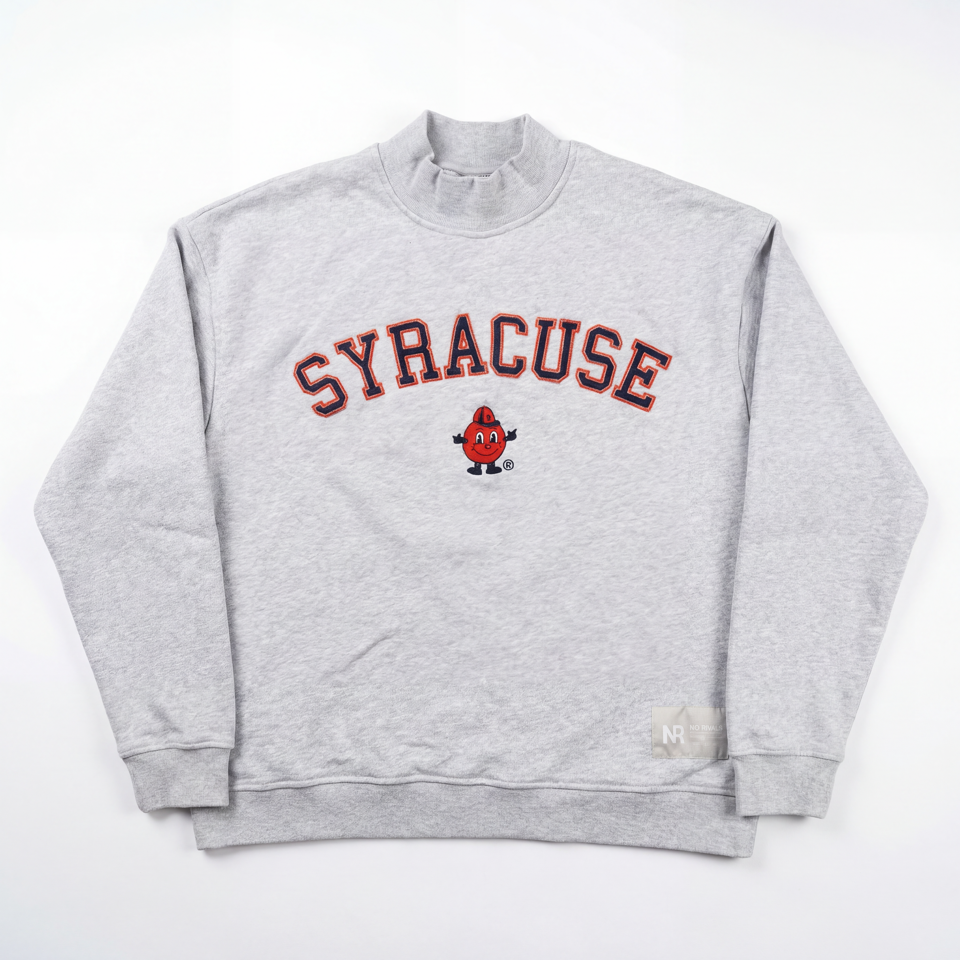 The No Rivals Syracuse Mock Neck is a gray heavyweight cotton sweatshirt featuring an oversized fit, bold orange and navy "SYRACUSE" lettering, and a cartoon orange mascot in the center, shown laid flat on a white background.
