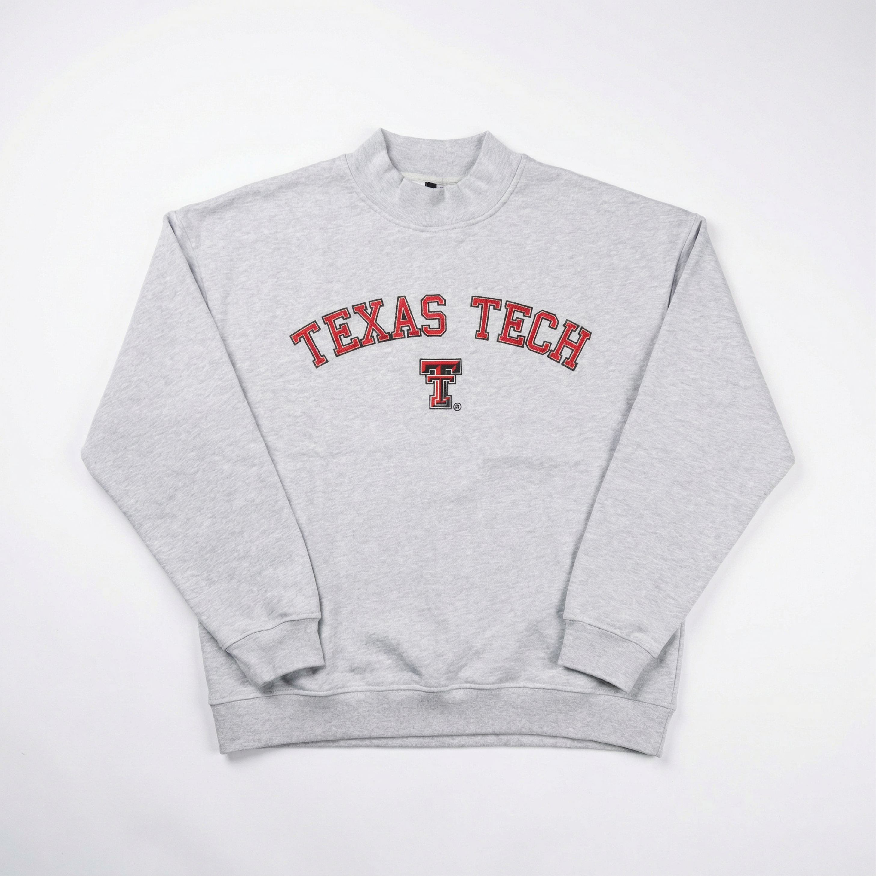 A light gray heavyweight cotton mock neck sweatshirt by No Rivals featuring "Texas Tech" in red and black across the chest with the double T logo underneath, shown laid flat on a white background.