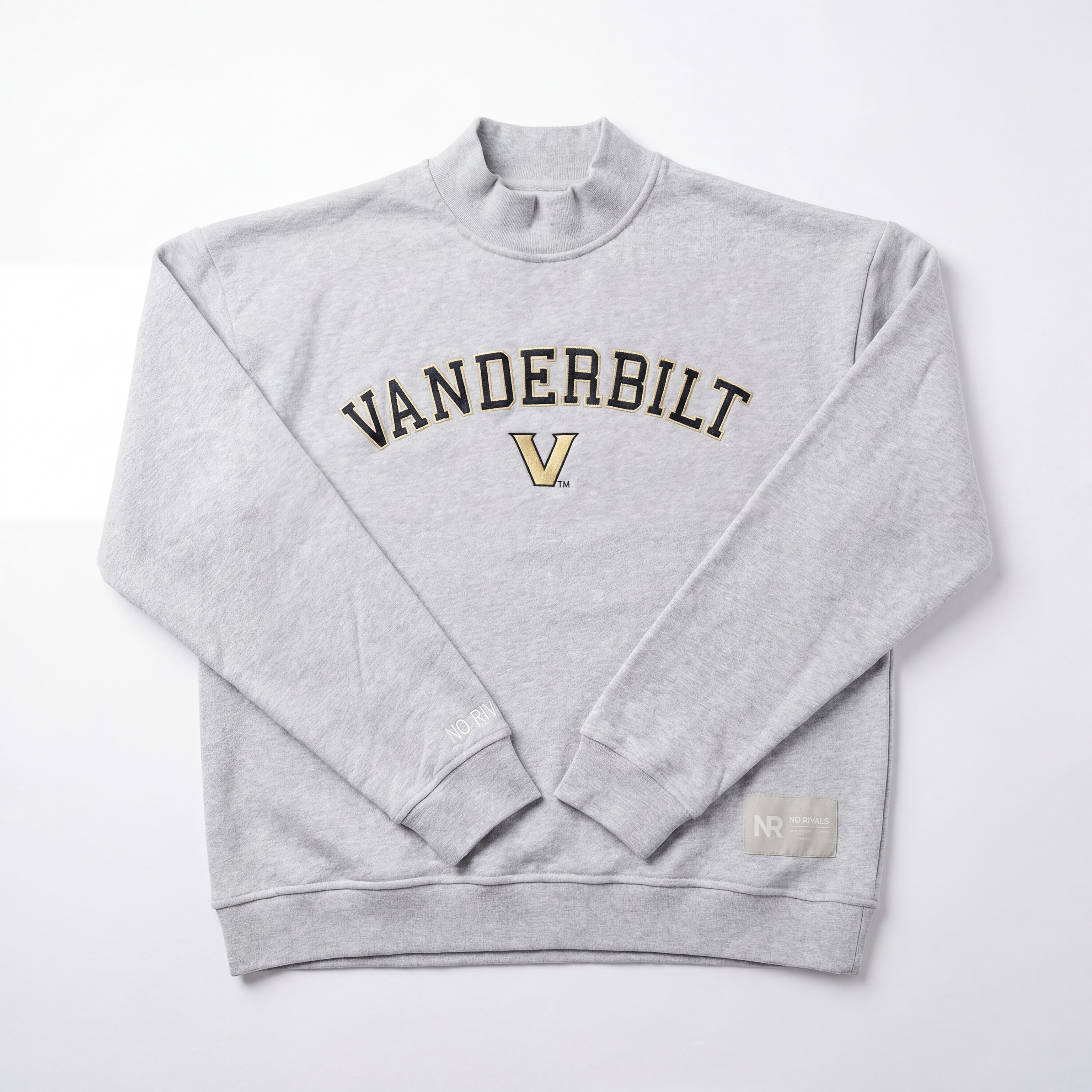 The No Rivals Vanderbilt Mock Neck is a light gray heavyweight cotton sweatshirt featuring black and gold "VANDERBILT" lettering and a gold V logo on the front, shown laid flat against a white background.