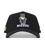 The No Rivals Mizzou Golf Hat in black features a tiger mascot in a shirt and pants above "MIZZOU" embroidered on the front, plus a small tiger logo on the brim's left side and offers a structured fit for comfort.