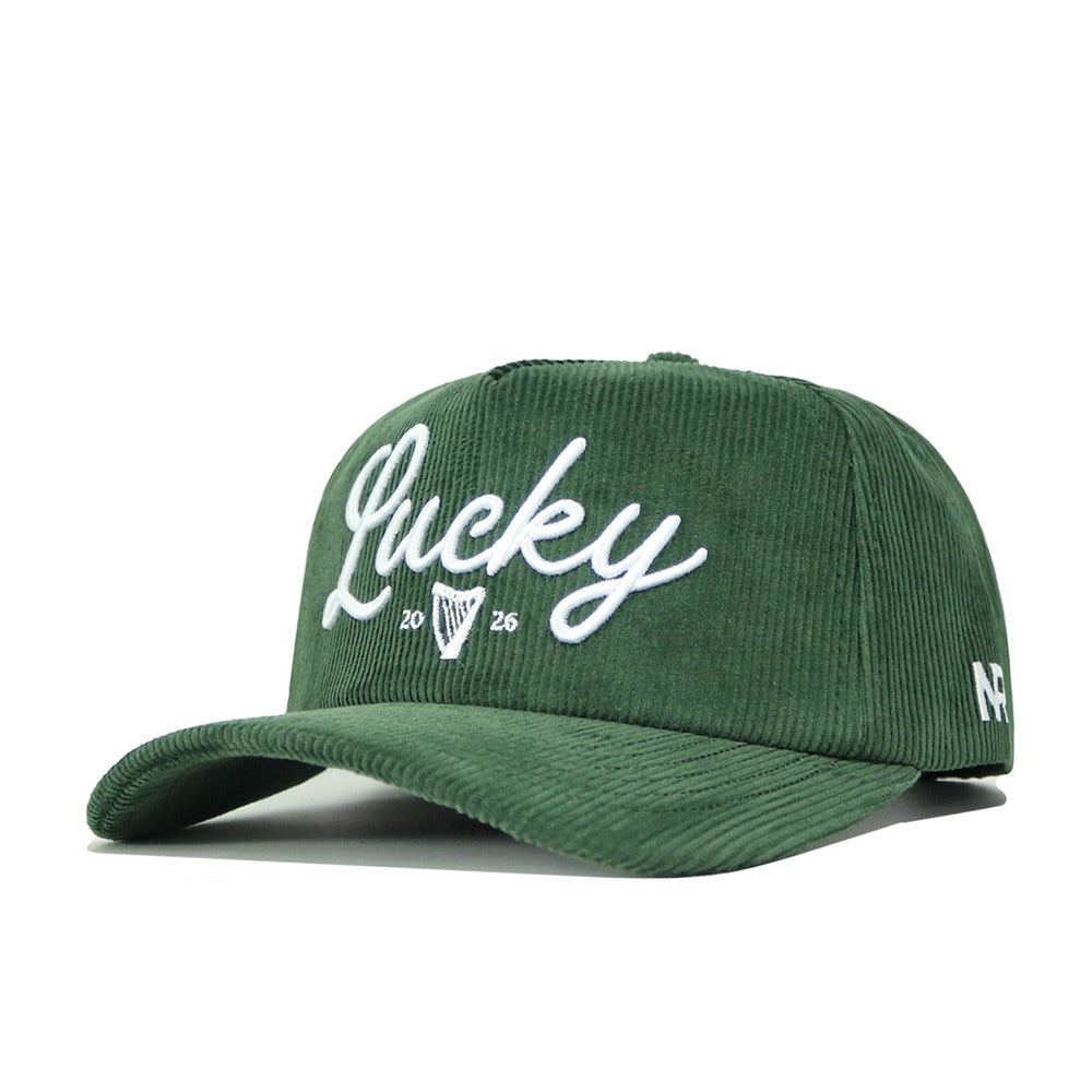 The No Rivals St.Pattys Lucky Cord Hat in green has an unstructured fit, "Lucky" embroidered in white script with 2026 and a harp logo on the front, plus AF initials on the side.