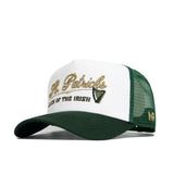The No Rivals St.Pattys Trucker Hat is green and white with mesh sides, an unstructured fit, adjustable snap back, and gold script reading "St. Patricks" above "LUCK OF THE IRISH," finished with a gold harp graphic on the front.