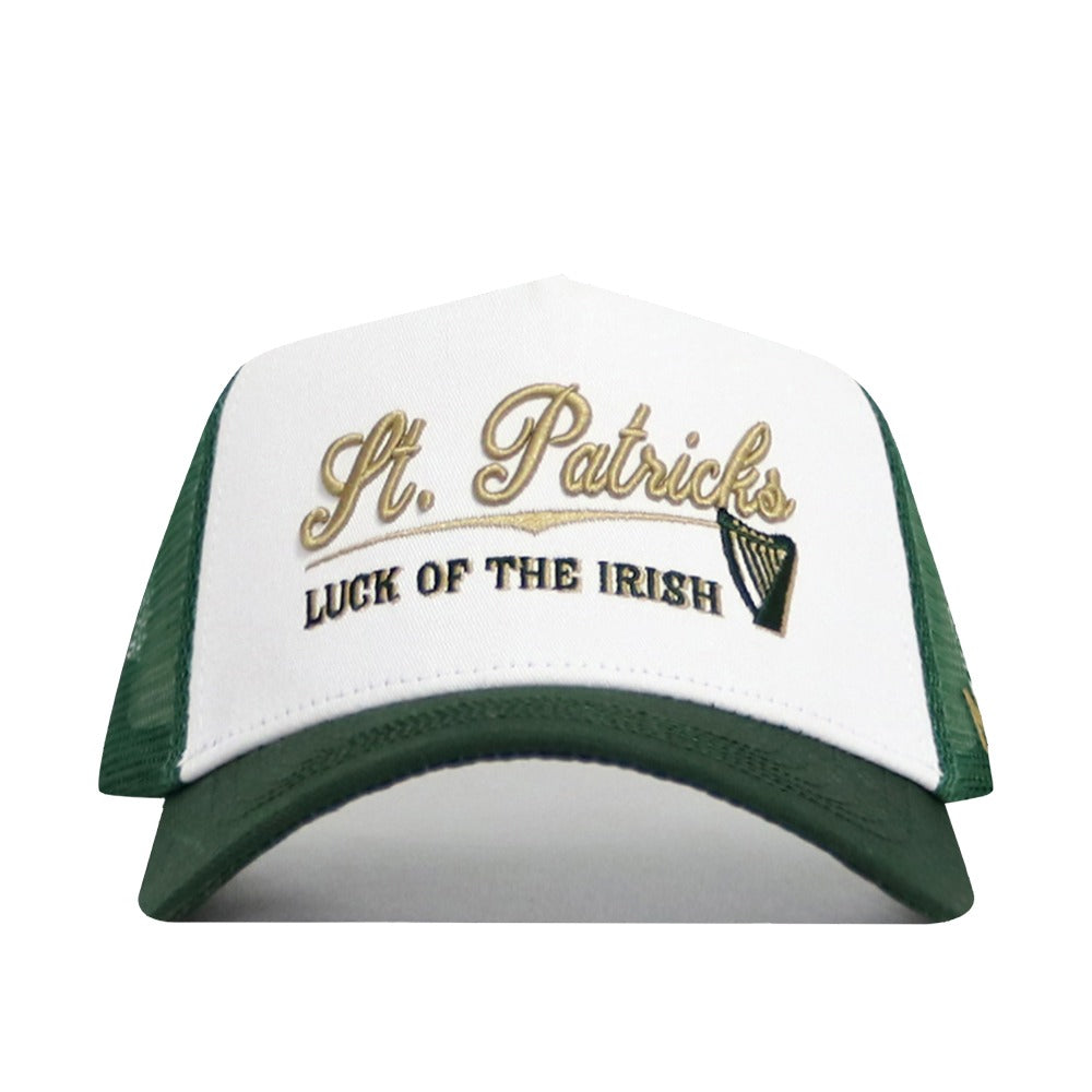 The No Rivals St.Pattys Trucker Hat is a white and green corduroy snapback featuring gold and black embroidery reading "St. Patricks" and "Luck of the Irish," plus a small harp design for festive style and comfort.
