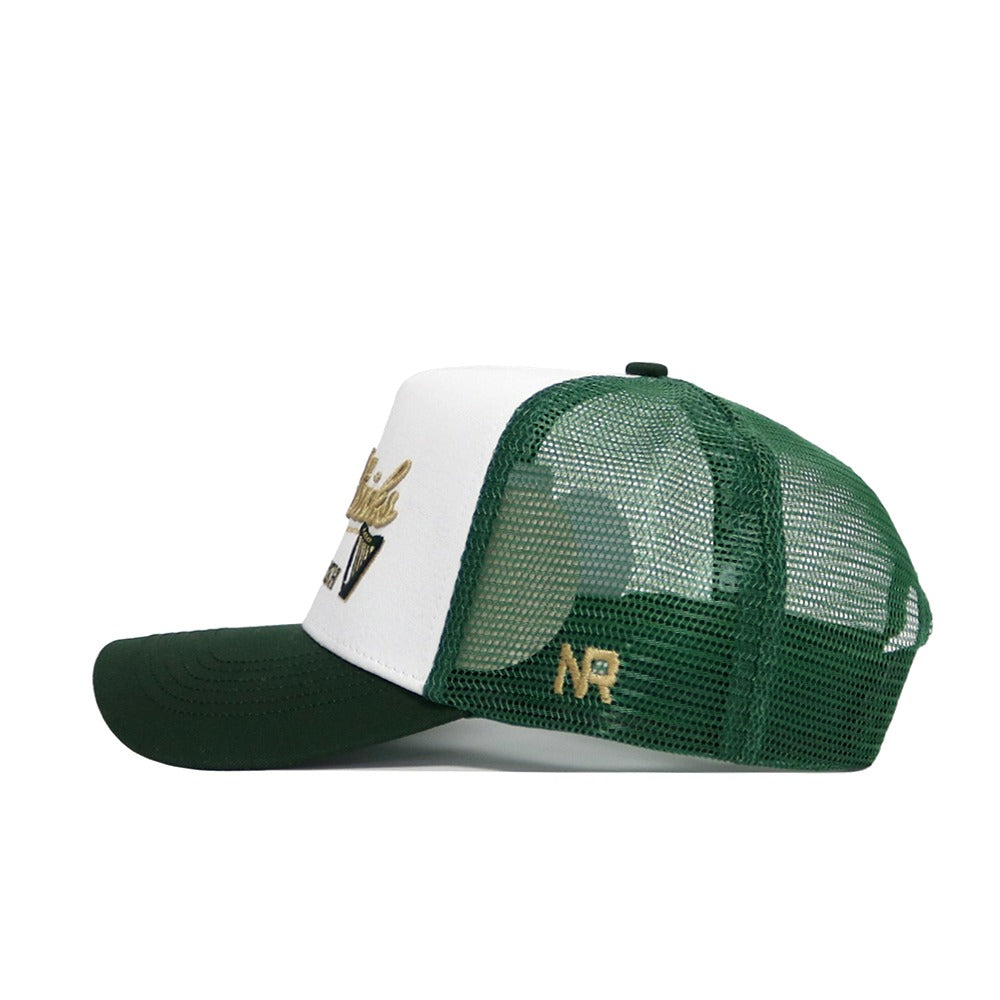 The St.Pattys Trucker Hat by No Rivals is a green and white snapback with mesh sides, a solid green bill, gold embroidered designs, and the initials AR on the back mesh.