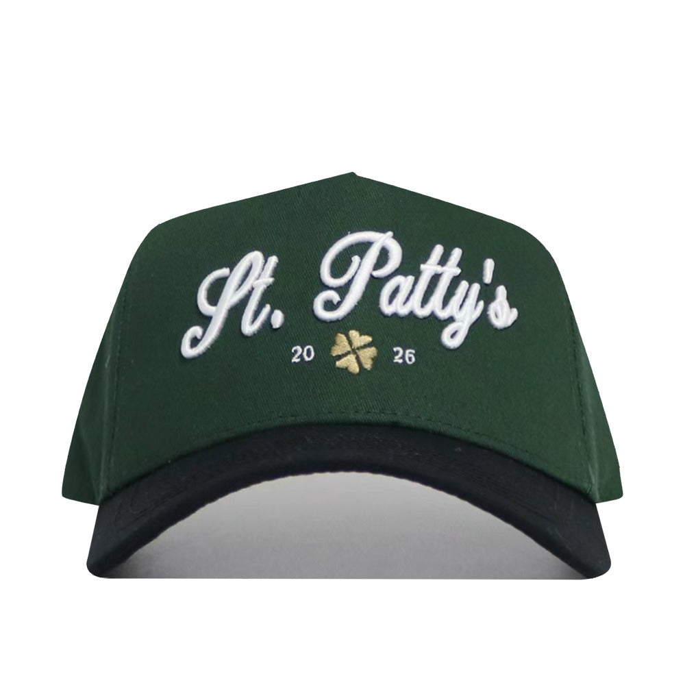 The No Rivals St.Pattys Shamrock Hat features green corduroy, "St. Pattys" embroidered in white, a gold shamrock, the numbers 20 and 26, an unstructured fit, and a black brim for casual style.