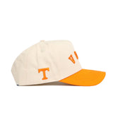 The No Rivals Right Side Up VOLS Hat features classic Tennessee Volunteers colors with a beige structured fit, orange brim, embroidered orange T and “VOLS” detailing, and an adjustable snap back for comfort. Crafted from high-quality cotton.