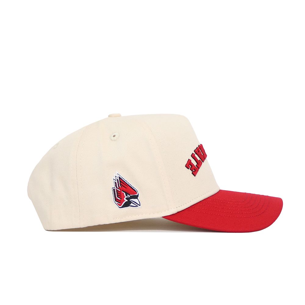 The No Rivals Upside Down Ball State Hat is a cream snapback with a red brim, red front embroidery, and a red, white, and black number 4 patch on the left side. Made from high-quality cotton for a structured fit.