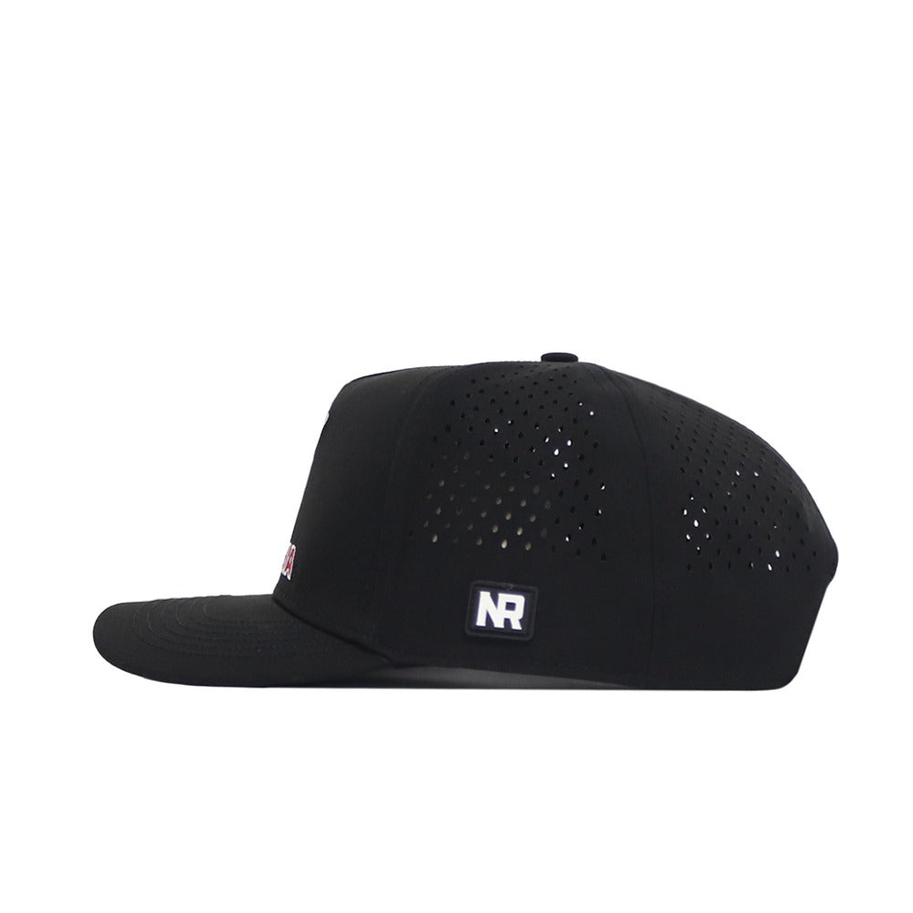 The Georgia Bulldogs Golf Hat by No Rivals is a black flat-brim snapback with side and back ventilation holes, crafted from a durable polyester-cotton blend. It features a rectangular NR logo patch on the side and is adjustable. Shown in profile on white.