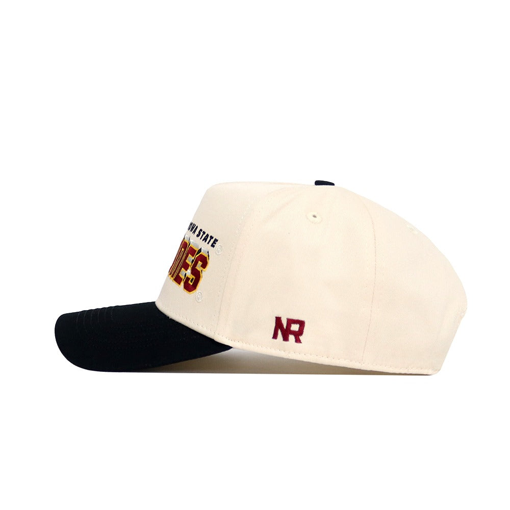 The Iowa State Punching Cy Alma Mater Hat - Classic by No Rivals is a cream cap with a black brim, red NR embroidery on the side, and red/yellow front text. Made of quality cotton with a structured fit for lasting comfort.