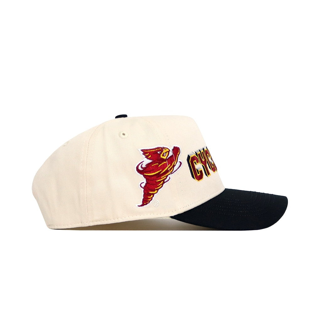 The No Rivals Iowa State Punching Cy Alma Mater Hat - Classic is a cream snapback with a black brim, embroidered red and yellow cyclone logo, "CYCLONES" text on the side, and made from high quality cotton for a structured fit.