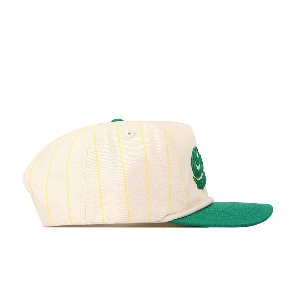 The No Rivals Oregon Pinstripe Hat features a cream base with yellow pinstripes, a green brim, and an embroidered logo. It has a snapback closure and is shown from the side against a white background.