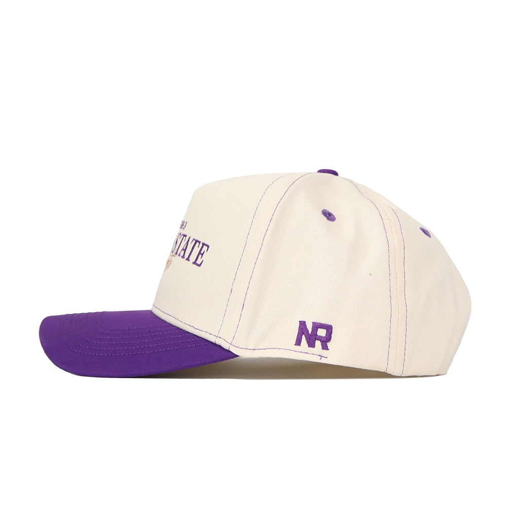 Introducing the Kansas State Wildcats Vintage Hat by No Rivals—a premium cream baseball cap made from high-quality cotton, featuring a striking purple brim and detailed purple embroidery, including the NR lettering on the side. This classic snapback is perfect for elevating your gameday fit.