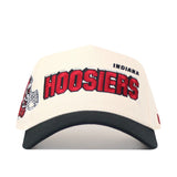 Beige cap with red 'Hoosiers' text and black visor on a white background
